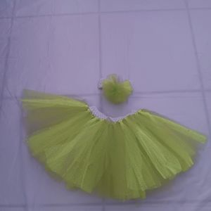 Tutu with hair band. Size 3-4 years old. Color phosphorecent green.